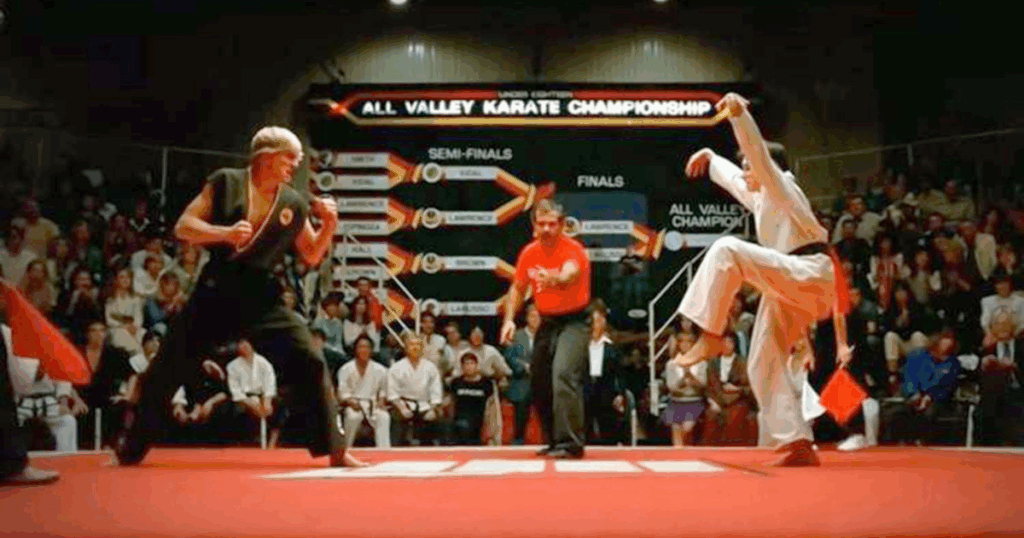 riginal Karate Kid about to perform the crane kick—symbol of focus, balance, and belief