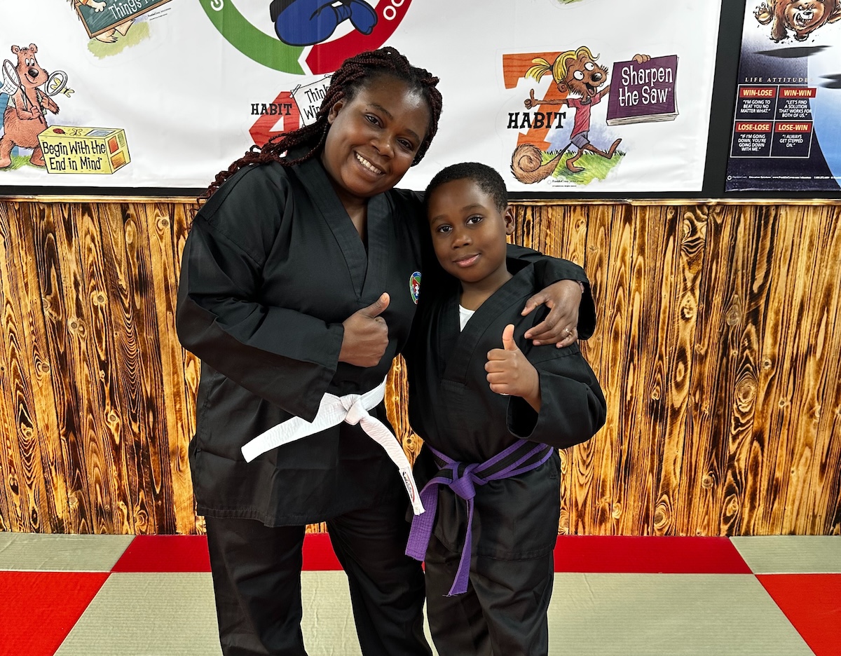 Mother and son training together at Kicx Academy Gloucester—building confidence, fitness, and family connection through martial arts