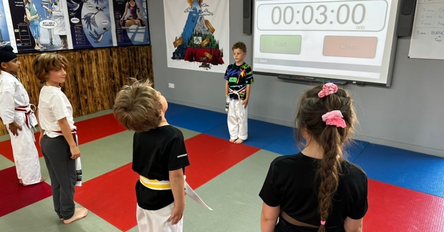 Student teaching classmates at Kicx Academy — building maturity and leadership through the maturity continuum